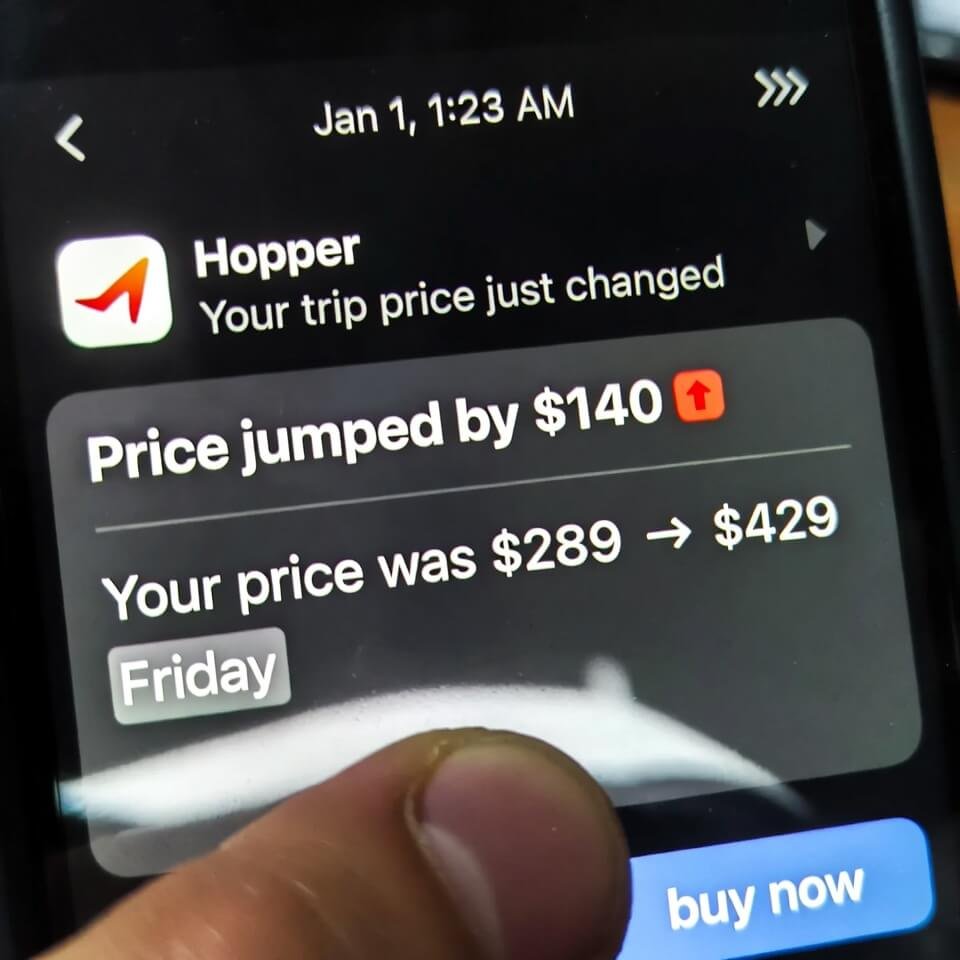 Phone showing ignored Hopper alert, price jumped $140